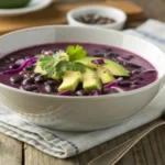 Purple black bean soup in a bowl