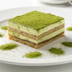 Finished matcha tiramisu topped with matcha powder and served in individual portions
